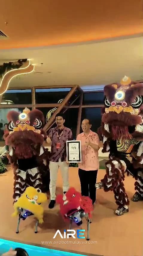 Robot lion-dance performance alongside traditional lion dancers