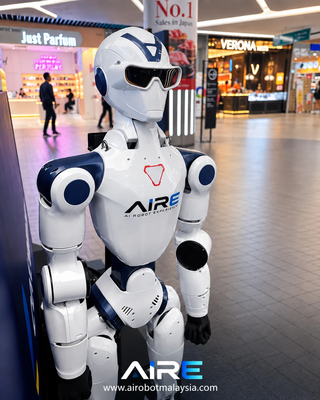 White Unitree R1 humanoid robot at a shopping mall