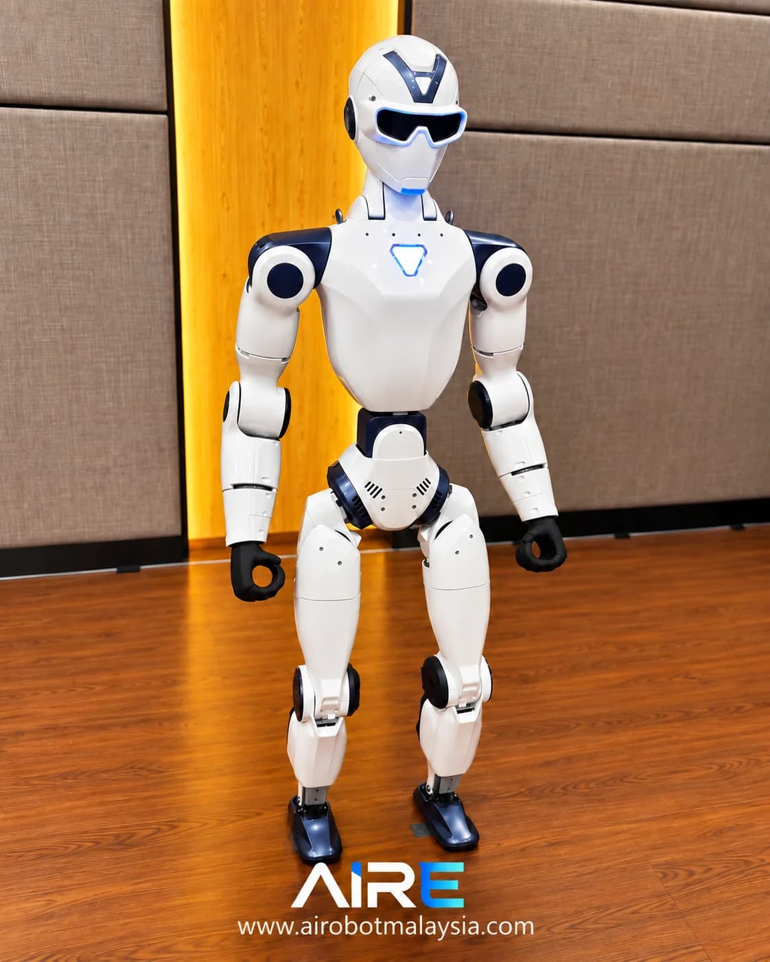 White Unitree R1 standing in a studio